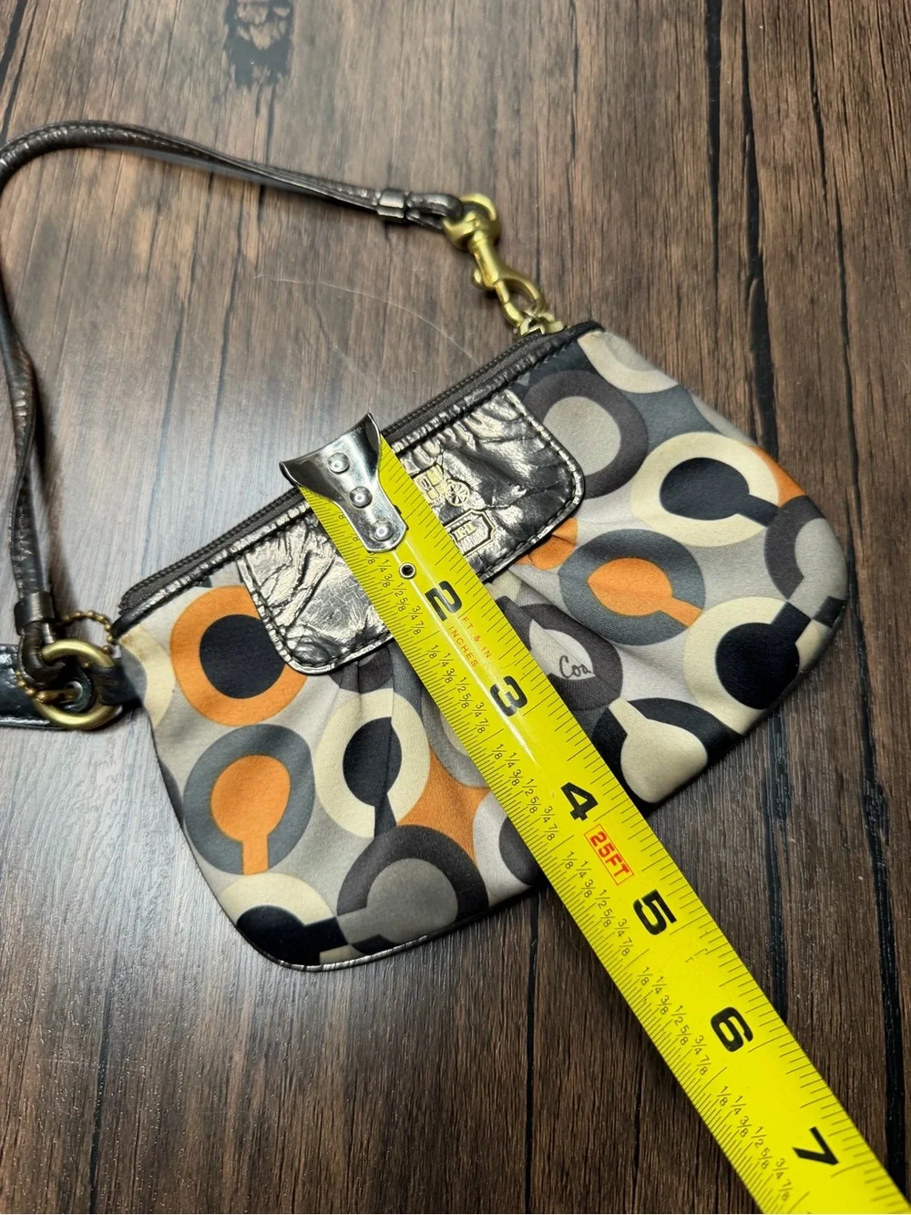 Coach Madison Graphic Op Art sateen Wristlet in Brown and Orange Accents